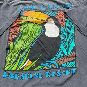Vintage faded‎ animal paradise 90's faded pocket tee with an amazing fit